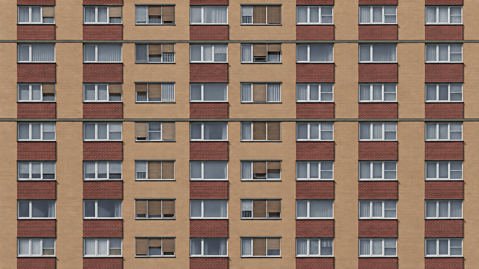 Windows on a brick tower block